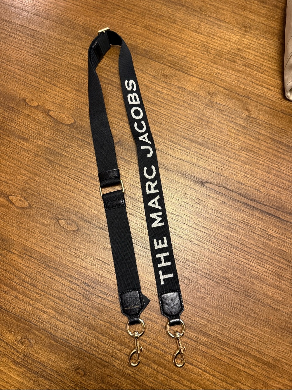 Marc Jacobs Black Strap with White Logo and Gold Hardware